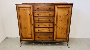 A MODERN METAL CRAFT AND PINE COMBINATION CABINET, THE SIX CENTRAL DRAWERS FLANKED BY CABINETS,