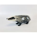 A WINSTANLY MODEL OF A BADGER, HEIGHT 8CM X LENGTH 24CM.