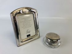 A SILVER PHOTO FRAME ALONG WITH A SILVER TOPPED DRESSING TABLE POT,