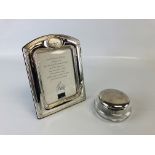 A SILVER PHOTO FRAME ALONG WITH A SILVER TOPPED DRESSING TABLE POT,