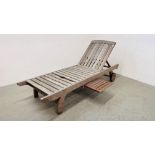 A SOLID TEAKWOOD GARDEN SUN LOUNGER.