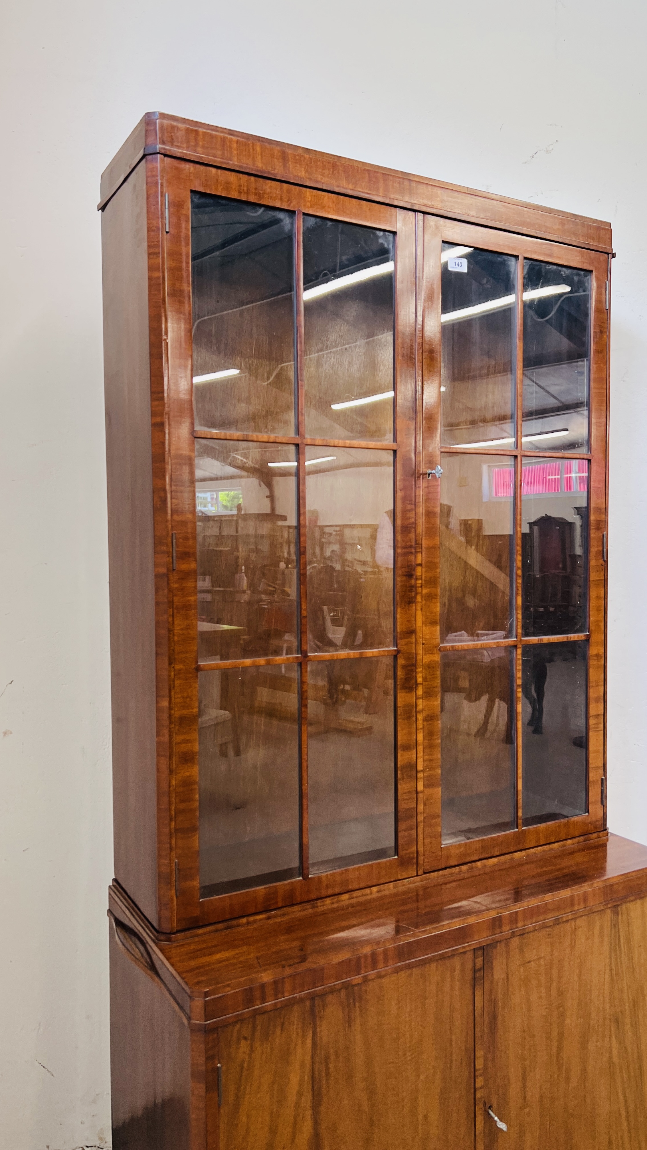 A 1930'S TWO DOOR MAHOGANY BOOKCASE ON CUPBOARD BASE - W 92CM. D 40CM. H 184CM. - Image 3 of 15