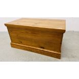 A SOLID WAXED PINE BLANKET BOX, W 94CM, D 50CM, H 48CM.