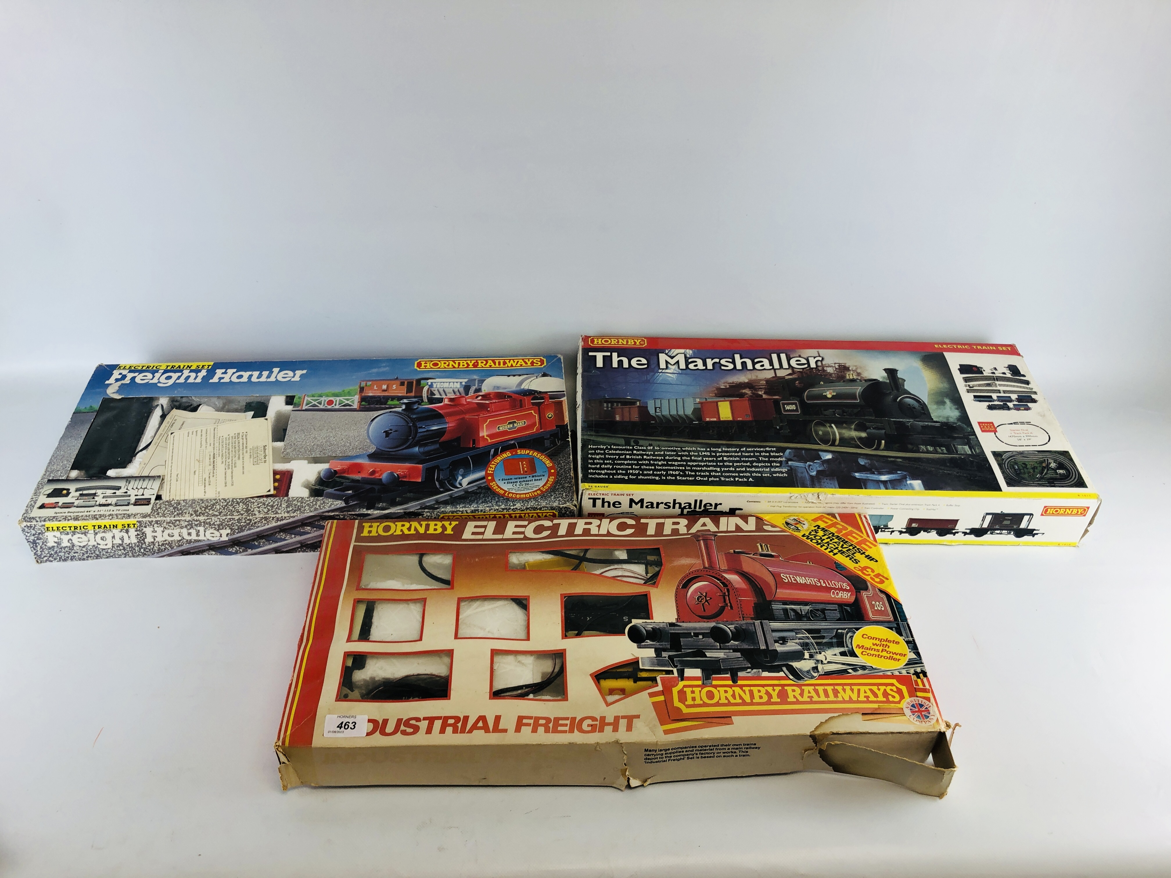 THREE BOXED HORNBY 00 GAUGE TRAIN SETS TO INCLUDE "THE MARSHALLER" "FREIGHT HAULER" & INDUSTRIAL