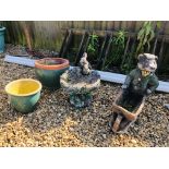 A GENTLEMAN BADGER PUSHING A WHEELBARROW CONCRETE PLANTER ALONG WITH RABBIT FAMILY BIRD BATH AND 2