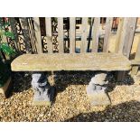 A CONCRETE GARDEN BENCH SUPPORTED BY SQUIRRELS, H 48CM X D 33CM X L 110CM.