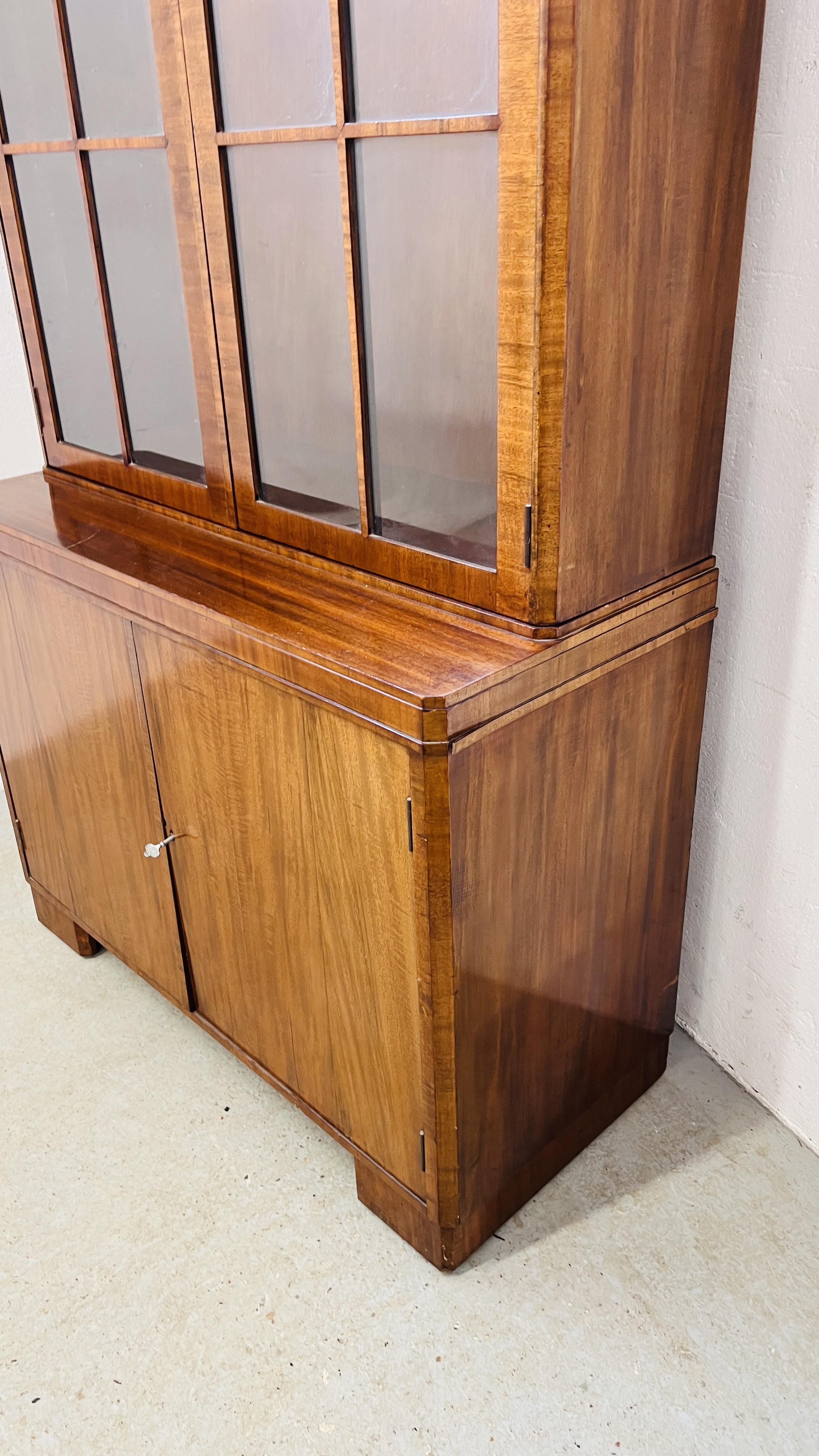 A 1930'S TWO DOOR MAHOGANY BOOKCASE ON CUPBOARD BASE - W 92CM. D 40CM. H 184CM. - Image 10 of 15