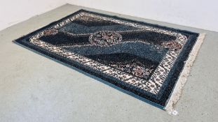 A MODERN BLUE PATTERN RUG LENGTH 2.33M WIDTH 1.59M.