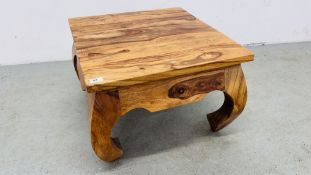 A HARDWOOD DESIGNER OCCASIONAL TABLE 61CM X 60.5CM X 42CM.