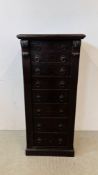 A STAINED OAK EIGHT DRAWER WELLINGTON CHEST, SOME LOSSES W 50CM. D 38CM. H 115CM.