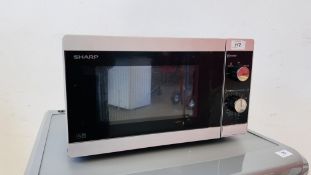 A SHARP STAINLESS STEEL MICROWAVE - SOLD AS SEEN.