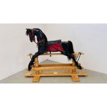 A LARGE CRAFTSMAN MADE ROCKING HORSE "BLACK BEAUTY" A/F HEIGHT TO TOP OF EARS 116CM. LENGTH 154CM.