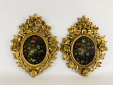A PAIR OF OVAL OIL ON BOARD FLORAL STUDIES,