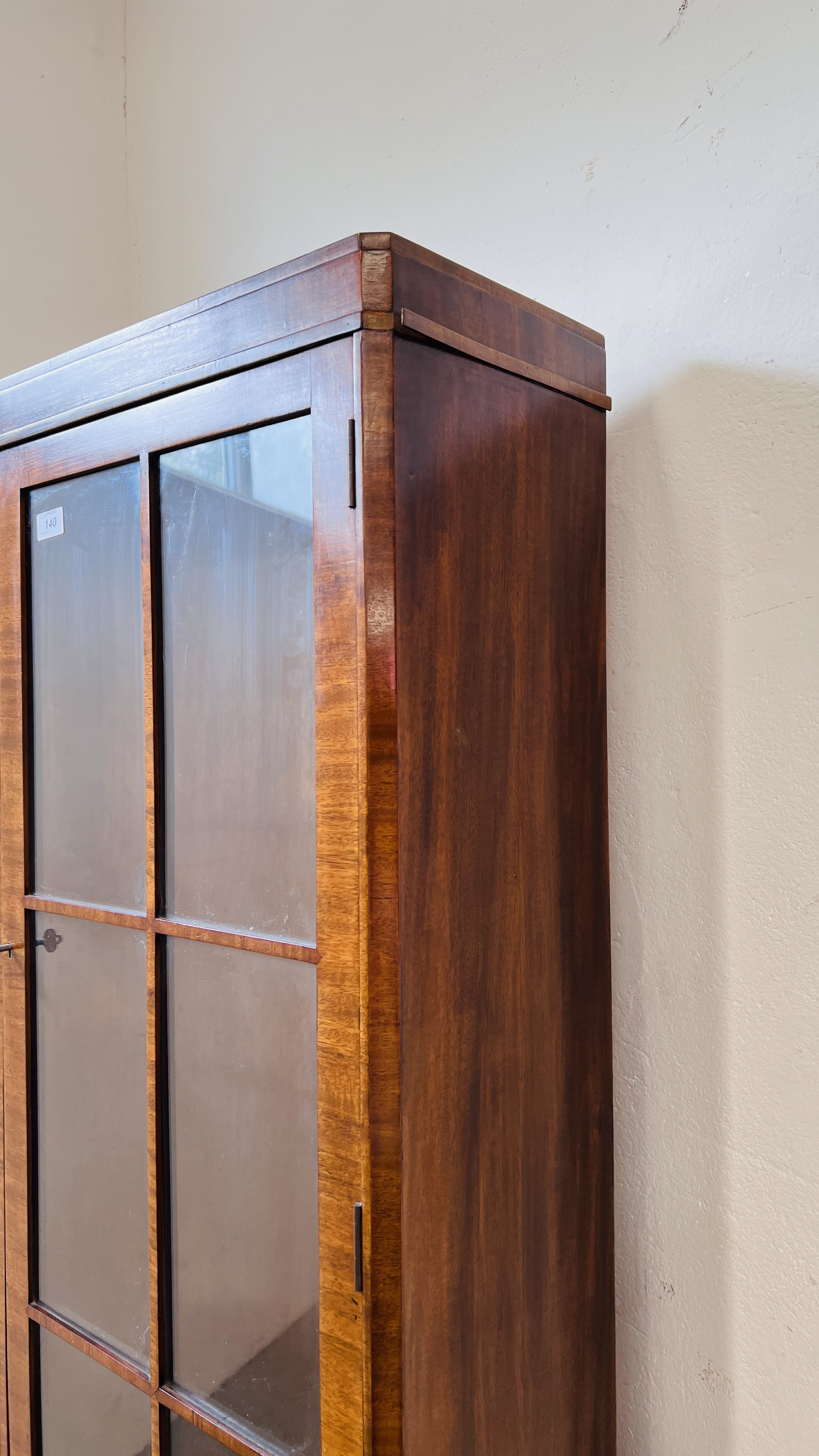 A 1930'S TWO DOOR MAHOGANY BOOKCASE ON CUPBOARD BASE - W 92CM. D 40CM. H 184CM. - Image 9 of 15