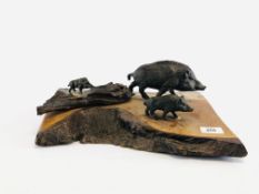 AN UNUSUAL CAST STUDIO STUDY OF WILD BOAR UPON A HARDWOOD STAND - W 36CM X D 29CM.