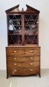 A GEORGIAN MAHOGANY SECRETAIRE CHEST WITH TWO DOOR GLAZED BOOKCASE ABOVE (GLASS A/F) W 109CM.
