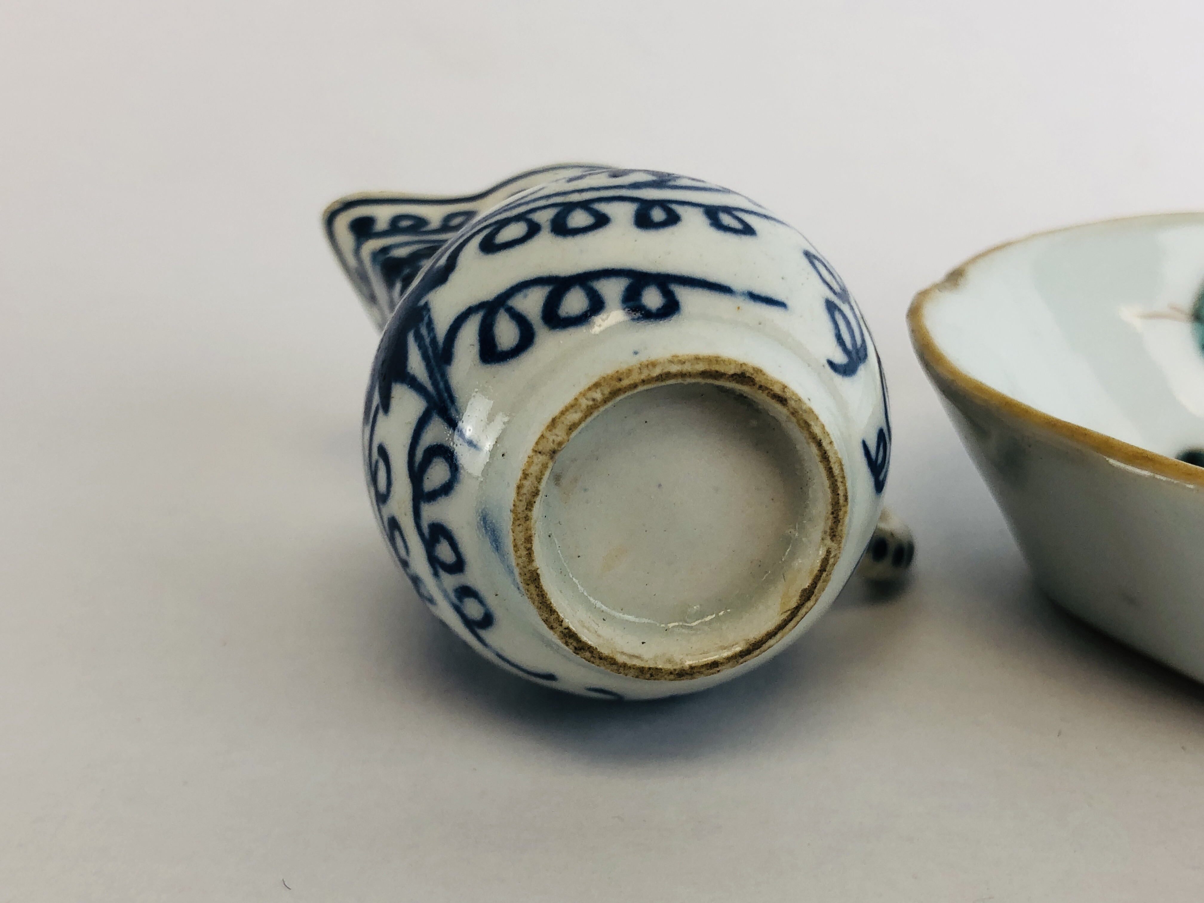 A BOW BLUE AND WHITE MINIATURE MILK JUG H 4CM ALONG WITH A CHINESE QIAN LONG OVAL SPOON TRAY L 13. - Image 9 of 11