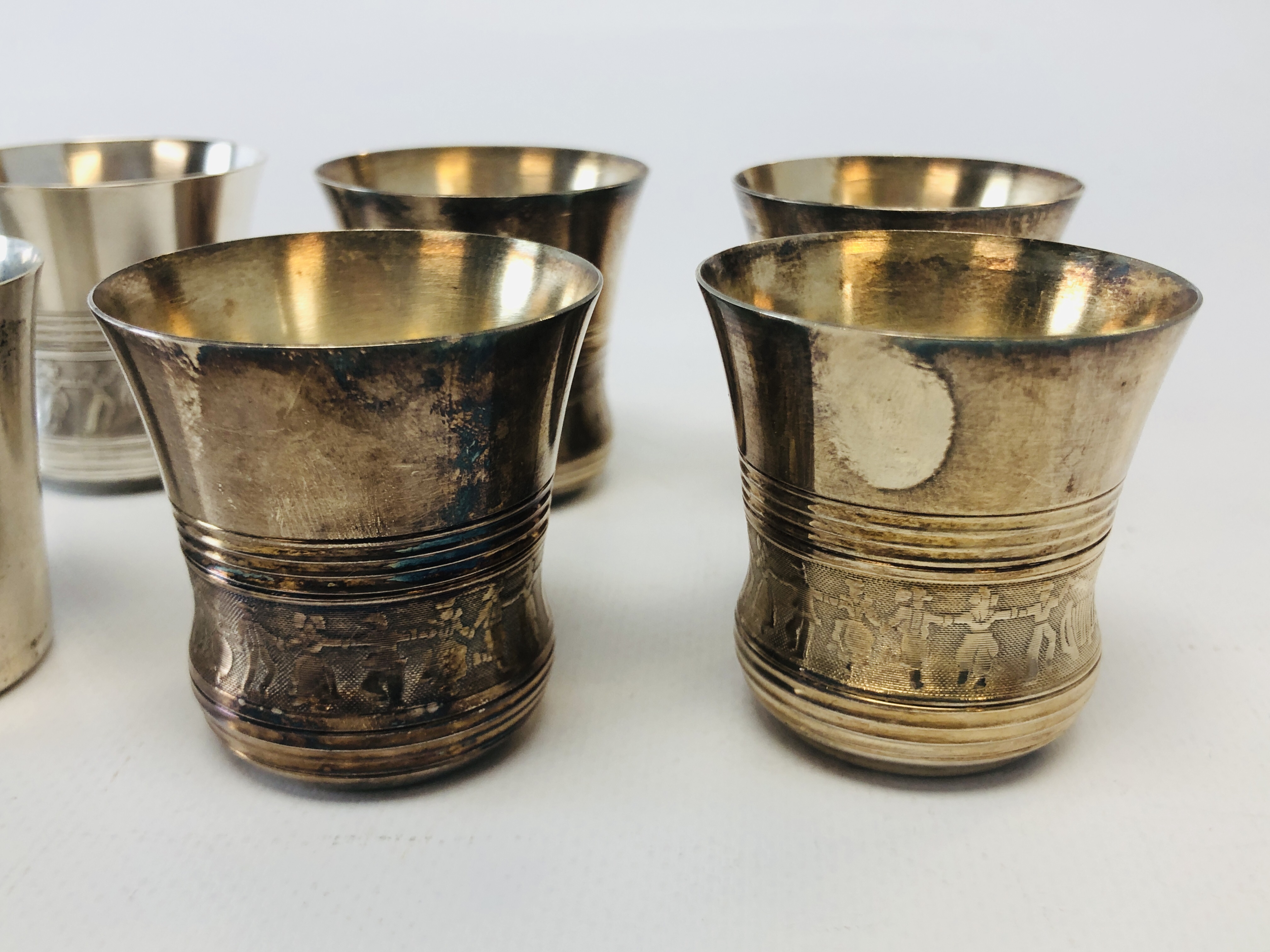 A SET OF FIVE CONTINENTAL WHITE METAL CUPS OF INVERTED BELL SHAPE DECORATED DANCING FIGURES BETWEEN - Image 2 of 10