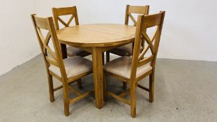 A MODERN LIGHT OAK DINING SET COMPRISING OF EXTENDING CIRCULAR TABLE AND FOUR CHAIRS - DIAMETER