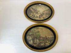 A PAIR OF VINTAGE COLOURED CLASSICAL PRINTS IN OVAL GILT FRAMES - W 64CM X H 51.5CM.