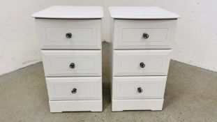 A PAIR OF MODERN KINGSTON WHITE FINISH THREE DRAWER BEDSIDE CHESTS EACH W 43CM. D 47CM. H 75CM.