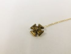 A 9CT GOLD CELTIC CROSS PENDANT SET WITH DIAMOND ON 9CT GOLD FINE CHAIN.