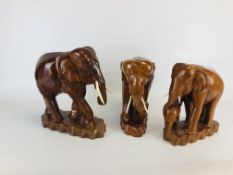 A GROUP OF 3 CARVED HARDWOOD ELEPHANT STUDIES.