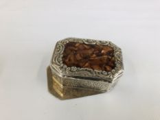 A CONTINENTAL WHITE METAL SNUFF BOX OF CANTED RECTANGULAR FROM THE LID INSET WITH A HARDSTONE