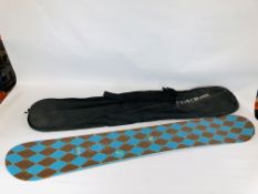 A K & Z SNOWBOARD IN TRAVEL CASE.