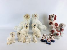 A GROUP OF 14 STAFFORDSHIRE STYLE SPANIELS TO INCLUDE 6 ROYAL DOULTON EXAMPLES.