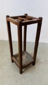 AN ANTIQUE OAK STICK / UMBRELLA STAND WITH DRIP TRAY INSERT,