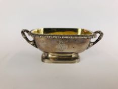 A GEORGE III SILVER GILT TWO HANDLED SALT, LONDON 1811 MAKER EMES & BARNARD, W 12CM.