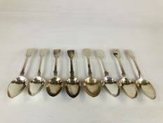 A MATCHED GROUP OF EIGHT SILVER FIDDLE PATTERN DESSERT SPOONS, SIX GEORGIAN AND TWO VICTORIAN.