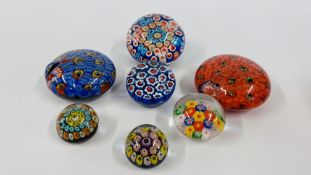 A GROUP OF 7 ASSORTED MILLEFIORI STYLE PAPERWEIGHTS OF VARIOUS SIZES.