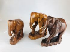 A GROUP OF 3 CARVED HARDWOOD ELEPHANT STUDIES.