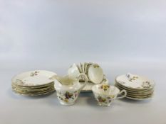 A VINTAGE 20 PIECE TEA SET HAND PAINTED IN A FLORAL DESIGN.