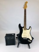 A BURSWOOD ELECTRIC GUITAR AND STAND ALONG WITH A G-10 BURSWOOD AMPLIFIER - SOLD AS SEEN.