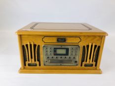 A CLASSIC "NOSTALGIC" REPRODUCTION MUSIC CENTRE CD/CASSETTE/RADIO/RECORD PLAYER - SOLD AS SEEN.