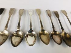 A MIXED GROUP OF ELEVEN SILVER FIDDLE PATTERN TEASPOONS, DIFFERENT DATES AND MAKERS.