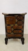 A DECORATIVE ORIENTAL DESIGN HARDWOOD 7 DRAWER MULTI CHEST H 64CM X W 41CM X D 32CM.