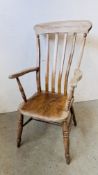 A VINTAGE SOLID ELM HIGH BACK WINDSOR CHAIR.