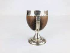 AN ANTIQUE SILVER MOUNTED COCONUT CUP MAKERS MARK S.P. H 10CM.