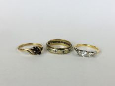 A 9CT GOLD ETERNITY RING A/F ALONG WITH A FURTHER YELLOW METAL EXAMPLE SET WITH 3 RUBY COLOURED