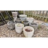 A GROUP OF 10 CONCRETE GARDEN POTS / PLANTERS VARIOUS SIZES TO INCLUDE SOME PAIRS.