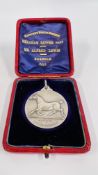 A SILVER HACKNEY HORSE SOCIETY MEDAL PRESENTED IN CASE.
