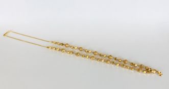 A DECORATIVE EASTERN STYLE NECKLACE MARKED 875.