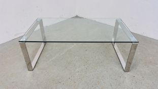 A DESIGNER GLASS CHROME LEG COFFEE TABLE 110CM X 60CM X 38CM H.