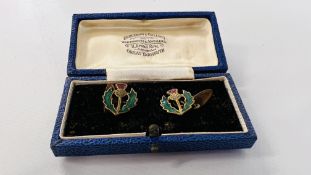 A PAIR OF VINTAGE ENAMELLED SCOTTISH THISTLE CUFF LINKS.
