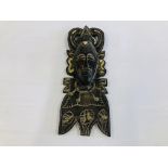 A WOODEN ETHNIC WALL HANGING MASK. H 59CM.