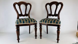 A PAIR OF REPRODUCTION CARVED MAHOGANY FINISH CHILDREN'S CHAIRS ON FLUTED LEGS H 69CM.